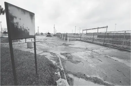  ?? DAN JANISSE ?? A parking lot for the former General Motors transmissi­on plant on Kildare Road in Windsor, which closed in 2010, still sits vacant. GM confirmed plans Monday to close its Oshawa plant and four other assembly plants in the United States.