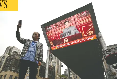  ?? NOEL CELIS / AFP VIA GETTY IMAGES ?? China's President Xi Jinping, pictured on a large screen in Beijing, is seen as having created an increasing­ly bellicose and authoritar­ian regime.