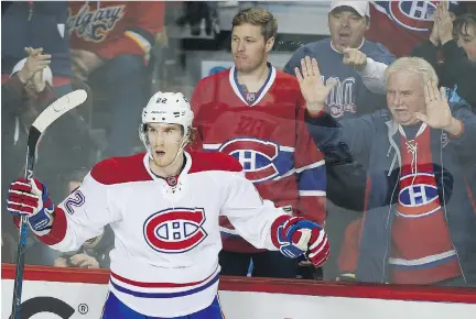  ?? JEFF McINTOSH/THE CANADIAN PRESS ?? Canadiens’ Dale Weise celebrates his goal during second-period NHL action against the Flames in Calgary, Friday.