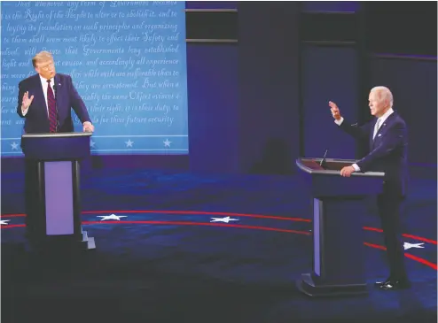  ?? Brian Snyder / reuters ?? U. S. President Donald Trump and Democratic presidenti­al nominee Joe Biden go at it in their debate Tuesday night.