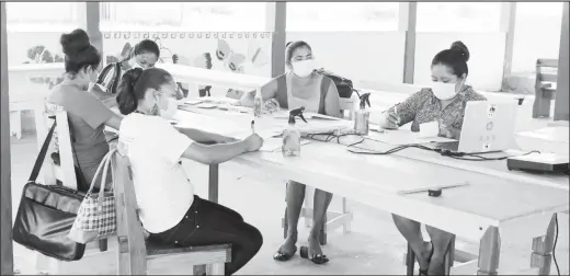  ??  ?? Immaculata Casimero (seated at extreme right) during a recent session with women