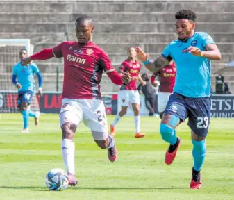  ?? ?? Thabo Maloisane makes sure the ball doesn’t reach NRB’s Justice Figuareido (23)