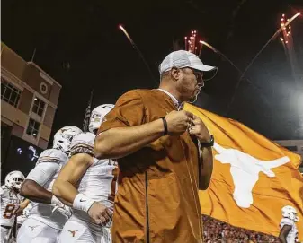  ?? Austin American-Statesman ?? Longhorns coach Tom Herman has posted a 31-18 record in four seasons at Texas with another bowl game waiting. Herman is under contract through the 2023 season.