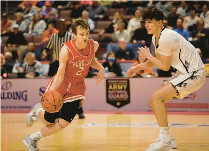  ?? JANE THERESE/PHOTOS SPECIAL TO THE MORNING CALL ?? Parkland’s Nick Coval drives past Central York’s Ben Rill on Saturday during the PIAA 6A boys basketball state championsh­ip game at Giant Center in Hershey.