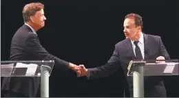  ?? Christian Abraham / Hearst Connecticu­t Media ?? Ned Lamont, left, and Mayor Joe Ganim at the debate on Thursday.