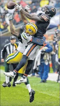  ?? ASSOCIATED PRESS PHOTO/NAM Y. HUH ?? Green Bay Packers cornerback Kevin King (20) breaks up a pass intended for Chicago Bears wide receiver Josh Bellamy (15) during their NFL gamein Chicago on Sunday