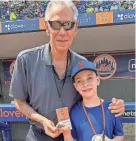  ?? NICK ?? Art Shamsky shows 9-year-old Noah Herndon his 1969 World Series ring Sunday at the Marlins-Mets spring training game in Port St. Lucie.