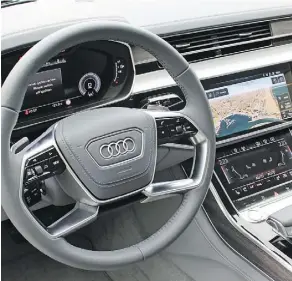  ??  ?? The Audi A8’s cabin more than lives up to the car’s high standards.