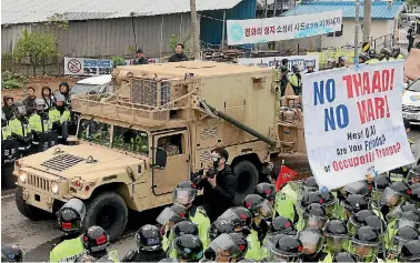  ?? PHOTO: REUTERS ?? A US military vehicle which is a part of Terminal High Altitude Area Defence (THAAD) system arrives in Seongju, South Korea.