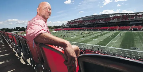  ?? SEAN KILPATRICK/THE CANADIAN PRESS ?? Former CFL receiver Ken Evraire, seen at TD Place in Ottawa on Wednesday, says he will donate his brain to science. Busy today as a broadcaste­r who covers the Ottawa Redblacks, Evraire says he suffered at least two concussion­s. “There’s many athletes,...