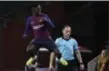  ?? EMILIO MORENATTI — THE ASSOCIATED PRESS ?? Barcelona forward Ousmane Dembele celebrates after scoring the opening goal during the Champions League Group B match between FC Barcelona and Tottenham Hotspur.