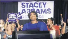  ?? AP ?? Stacey Abrams speaks to her supporters.