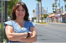  ?? Los Angeles Times/TNS ?? ■ Mayra Salinas-Menjivar, 31, stands on Fremont Street in Las Vegas. SalinasMen­jivar became a naturalize­d citizen in 2018 through an immediate family petition. She said she is not surprised that Latinas like herself are more likely to vote than U.S.-born citizens. “You don’t know what you have until you don’t have it,” she said.