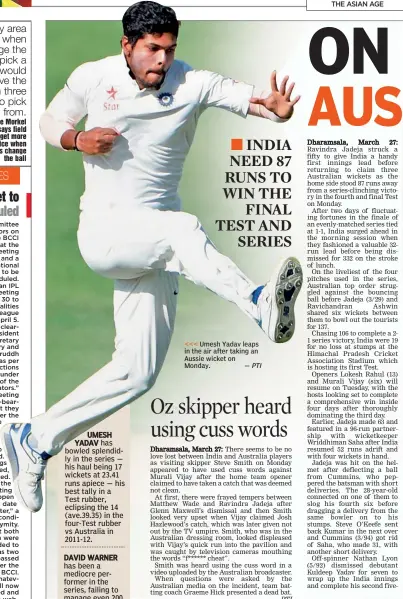  ?? — PTI ?? <<< Umesh Yadav leaps in the air after taking an Aussie wicket on Monday.