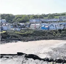  ??  ?? New Quay in Ceredigion, where the county council introduced its own proactive measures early on during the coronaviru­s pandemic.