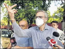  ?? ANI ?? Former J&K CM and National Conference vice-president Omar Abdullah outside the ED office in New Delhi on Thursday.