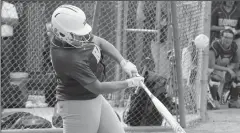  ?? MIKE BUSH/NEWS-SENTINEL ?? Liberty Ranch’s Ashley Hubert makes contact with the ball in Wednesday's Sac-Joaquin Section Division IV softball playoff game against Kimball.