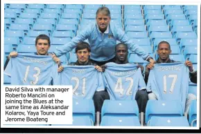  ??  ?? David Silva with manager Roberto Mancini on joining the Blues at the same time as Aleksandar Kolarov, Yaya Toure and Jerome Boateng
