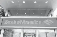  ?? ELISE AMENDOLA AP ?? Bank of America is reducing overdraft fees to $10 from $35.