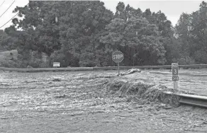  ?? KEHAULANI CERIZO/THE MAUI NEWS VIA AP ?? Heavy rains caused a dam to overflow on the Hawaiian island of Maui, and nearby residents in the community of Haiku were evacuated, county officials said Monday.