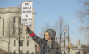  ?? JIM VONDRUSKA/GETTY IMAGES ?? Activists protest the verdict in the Kyle Rittenhous­e trial on Sunday in Kenosha.