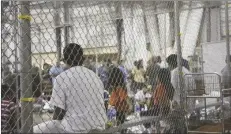  ?? U.S. CUSTOMS AND BORDER PROTECTION’S RIO GRANDE VALLEY SECTOR VIA AP, FILE ?? In this 2018, file photo provided by U.S. Customs and Border Protection, people who’ve been taken into custody related to cases of illegal entry into the United States, sit in one of the cages at a facility in McAllen, Texas.