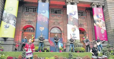  ?? Picture: Perthshire Picture Agency. ?? The Red Hot Chilli Pipers performing outside City Hall at the launch of Perth’s bid in August.