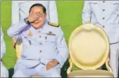  ?? AFP FILE ?? Hide and seek: Netizens have identified 25 expensive luxury watches that Prawit Wongsuwan has worn.