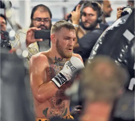  ?? JOE CAMPOREALE, USA TODAY SPORTS ?? Conor McGregor, above, could see a $100 million payday as part of his PPV fight against Floyd Mayweather Jr. on Aug. 26.