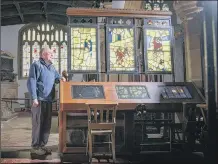  ?? PICTURES: TONY JOHNSON ?? ‘HISTORICAL JIGSAW’: A magnif ying glass highlights the detail in the 15th century stained glass from Thornhill Parish Church, Dewsbury, being restored by conservato­r Jonathan Cooke in his workshop near Ilkley.