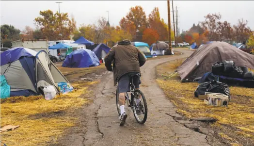  ?? Jim Wilson / New York Times ?? More makeshift evacuation camps like this one set up after Butte County’s Camp Fire could be in California’s future.