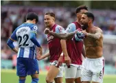  ?? AFP ?? Aston Villa’s Matty Cash, left, and Douglas Luiz celebrate after the win over Brighton