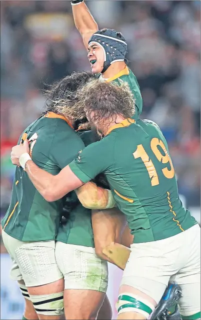  ??  ?? South Africa’s Cheslin Kolbe, RG Snyman and Franco Mostert celebrate their team’s second try