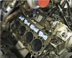  ??  ?? Obviously, the goal here was to get the cylinder heads off the engine so the head gaskets could be replaced. While the idea of it seems pretty straight forward, the labor time adds up quickly. Extreme care must be taken on disassembl­y so that foreign...