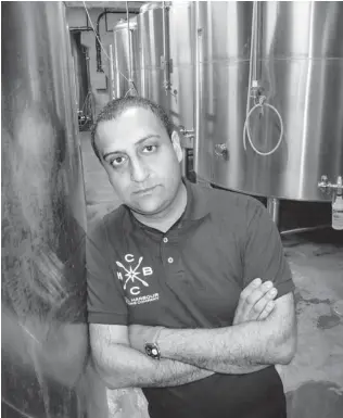  ??  ?? Kanwar ‘ Kenny’ Boparai will produce 550,000 litres of beer this year, as well as vodka and gin, in Coal Harbour Brewers and Distillers’ east side plant.
