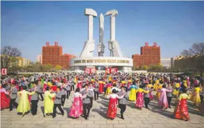  ??  ?? Students participat­e in a mass dance performanc­e as part of celebratio­ns marking the anniversar­y of the birth of late North Korean leader Kim Il-sung, known as the ‘Day of the Sun’, at the Monument to the Worker’s Party Founding, in Pyongyang yesterday.
