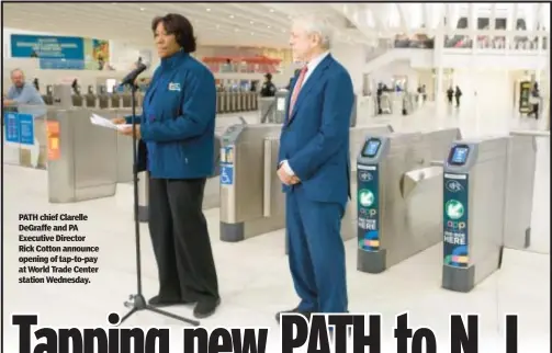  ?? ?? PATH chief Clarelle DeGraffe and PA Executive Director Rick Cotton announce opening of tap-to-pay at World Trade Center station Wednesday.