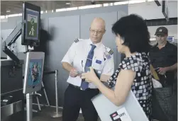  ?? Pictures: AFP ?? SIMPLE. A woman boarding a flight goes through facial recognitio­n verificati­on system VeriScan at Dulles Internatio­nal Airport in Virginia.