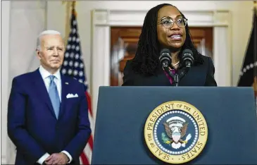  ?? CAROLYN KASTER/AP 2022 ?? The testimony on Monday of Judge Ketanji Brown Jackson, pictured in February with President Joe Biden, will give most Americans, as well as the Senate, their most extensive look yet at the Supreme Court nominee.
