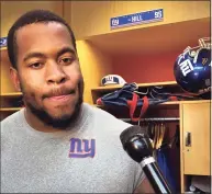  ?? Tom Canavan / Associated Press ?? New York Giants defensive lineman B.J. Hill talks to the media after a 2018 practice in East Rutherford, N.J. The Giants have acquired center Billy Price from the Bengals in a trade for defensive lineman Hill.