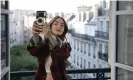  ?? Photograph: Stephanie Branchu/AP ?? Lily Collins takes a selfie in Emily in Paris.