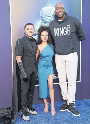  ?? GETTY IMAGES/AFP ?? Chosen Jacobs, Lexi Underwood and John Salley attend Disney+’s ‘Sneakerell­a’ premiere in New York City on Wednesday.