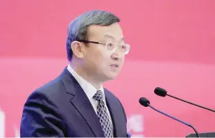  ?? — Reuters ?? Chinese Vice-commerce Minister and Deputy China Internatio­nal Trade Representa­tive Wang Shouwen speaks at the annual session of China Developmen­t Forum (CDF) 2018 in Beijing, China .