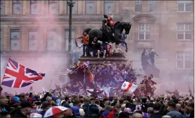  ??  ?? Some Rangers fans were accused of displaying anti-catholic bigotry at their gathering in Glasgow city centre on Saturday, highlighte­d by both First Minister Nicola Sturgeon and Justice Secretary Humza Yousaf