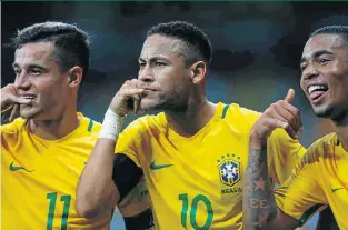  ?? Picture: EPA ?? WHO YOU GONNA CALL? Brazil’s Neymar, centre, celebrates with teammates Philippe Coutinho, left, and Gabriel Jesus after scoring against Argentina in their 2018 World Cup qualifying match at Belo Horizonte in Brazil, the scene of their 7-1 drubbing by...