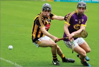  ??  ?? The ball eludes Wexford’s Kyle Firman and Kilkenny corner-back Tommy Ronan.