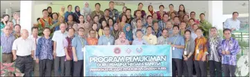  ??  ?? Rosey (front, ninth right) in a group photo with the participan­ts of the two-day programme conducted by Subis District Education Office.