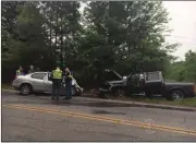  ?? Sarah Lane / Rome News-Tribune ?? Floyd County police respond to a fatal wreck on Ga. 140 on Sunday. One man was killed and another man was injured.