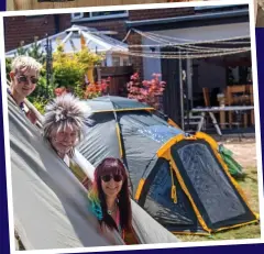  ??  ?? We’re still happy campers: The Carter family have pitched tents in their garden in Little Bookham, Surrey
