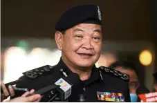  ??  ?? Taking action: abdul Hamid said more police and armed Forces personnel will be hauled up for investigat­ions. — Bernama